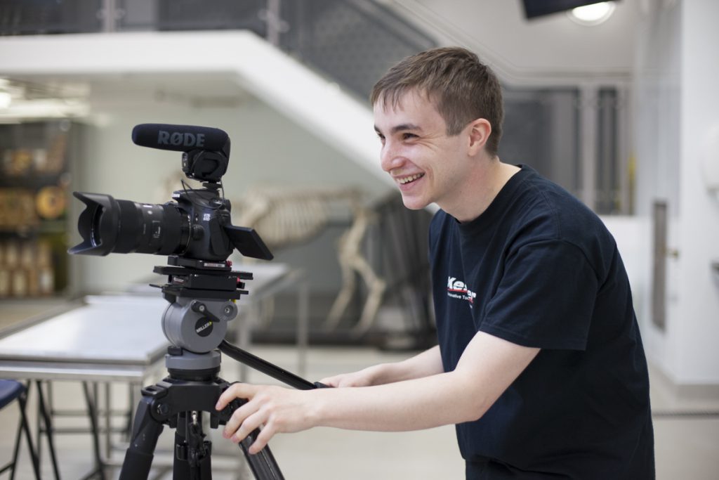 Michael Westcott filming an interview for edinburgh university
