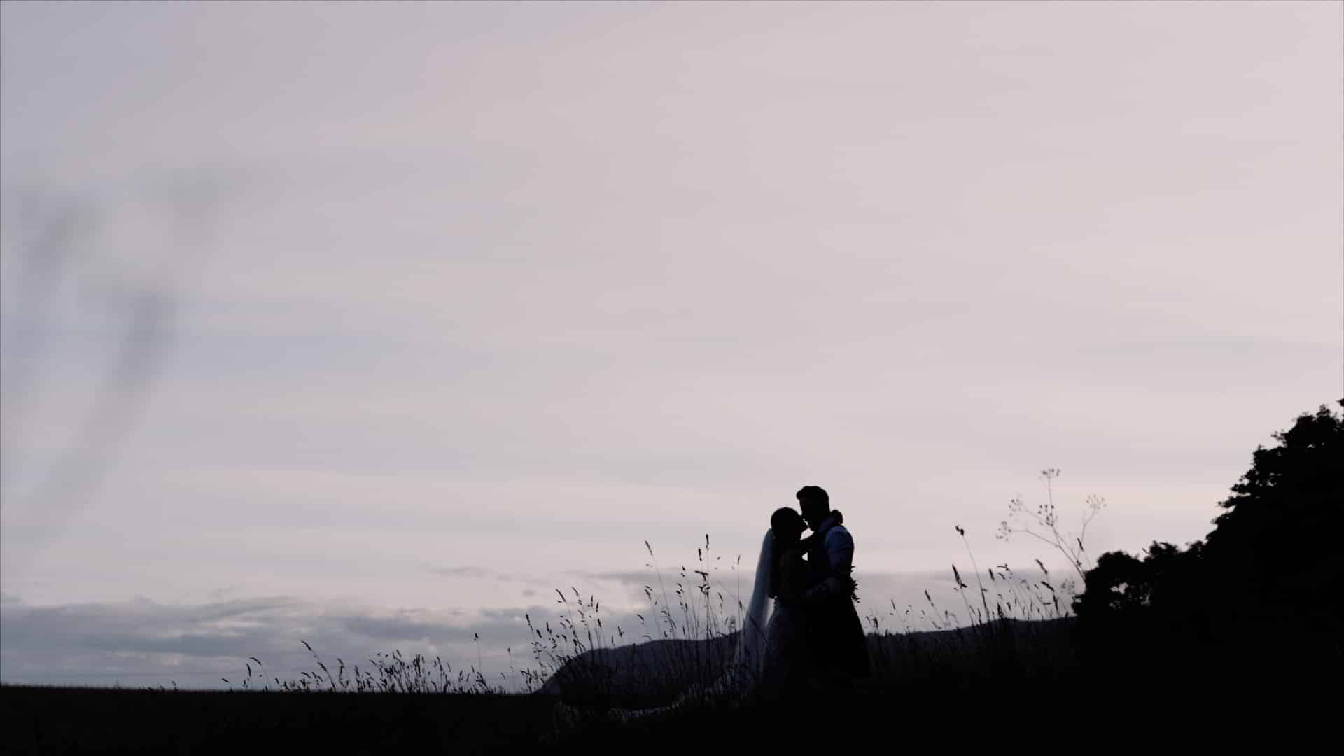 a silhouette of rachael and ryan wedding at loch ness country house hotel 2023