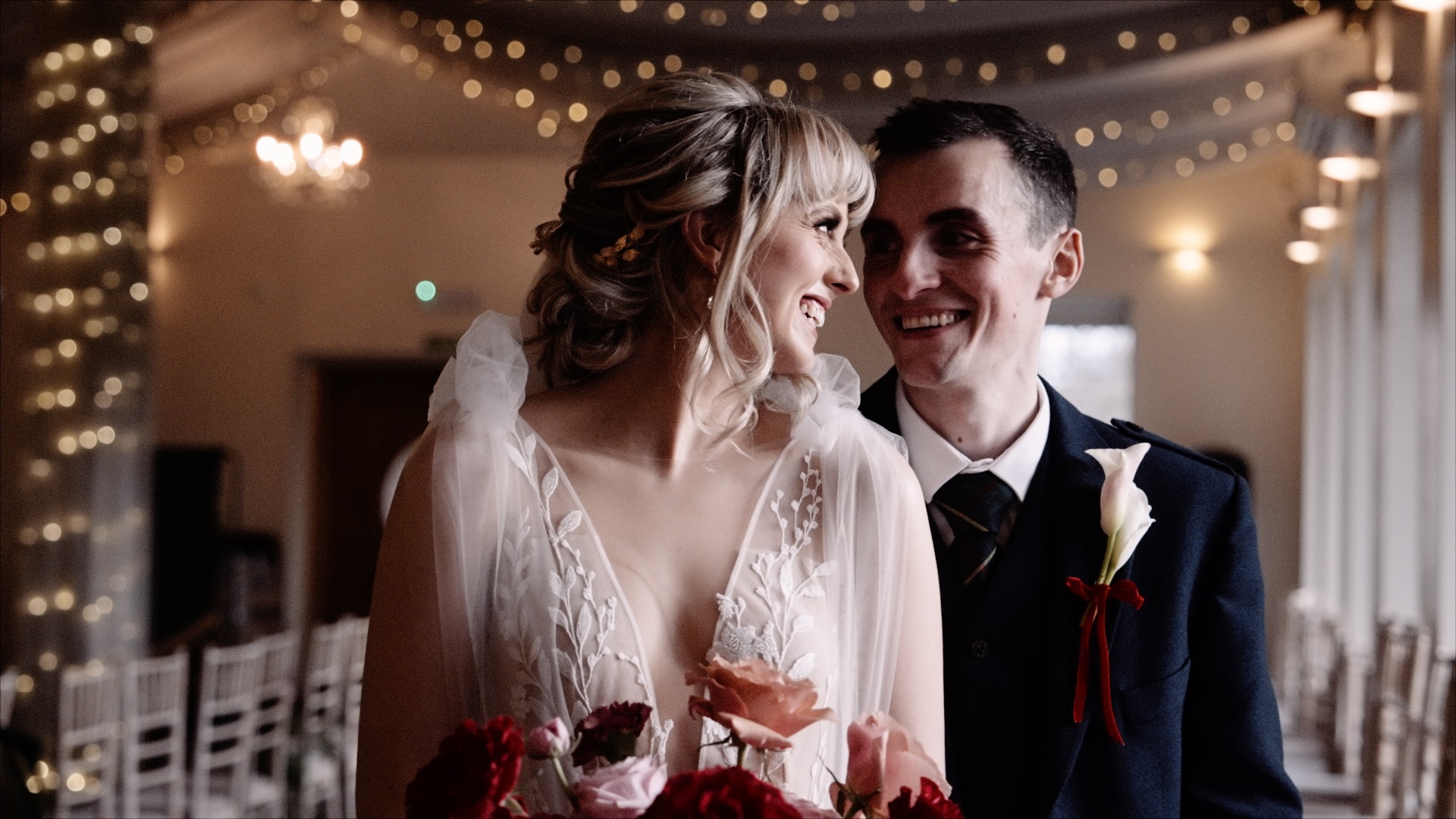Jodie and Paul gazing into each other eyes at Logie Country House.