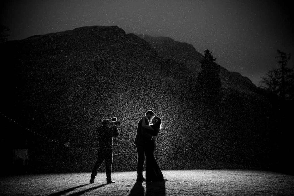 michael westcott films in the rain filming a romantic couple