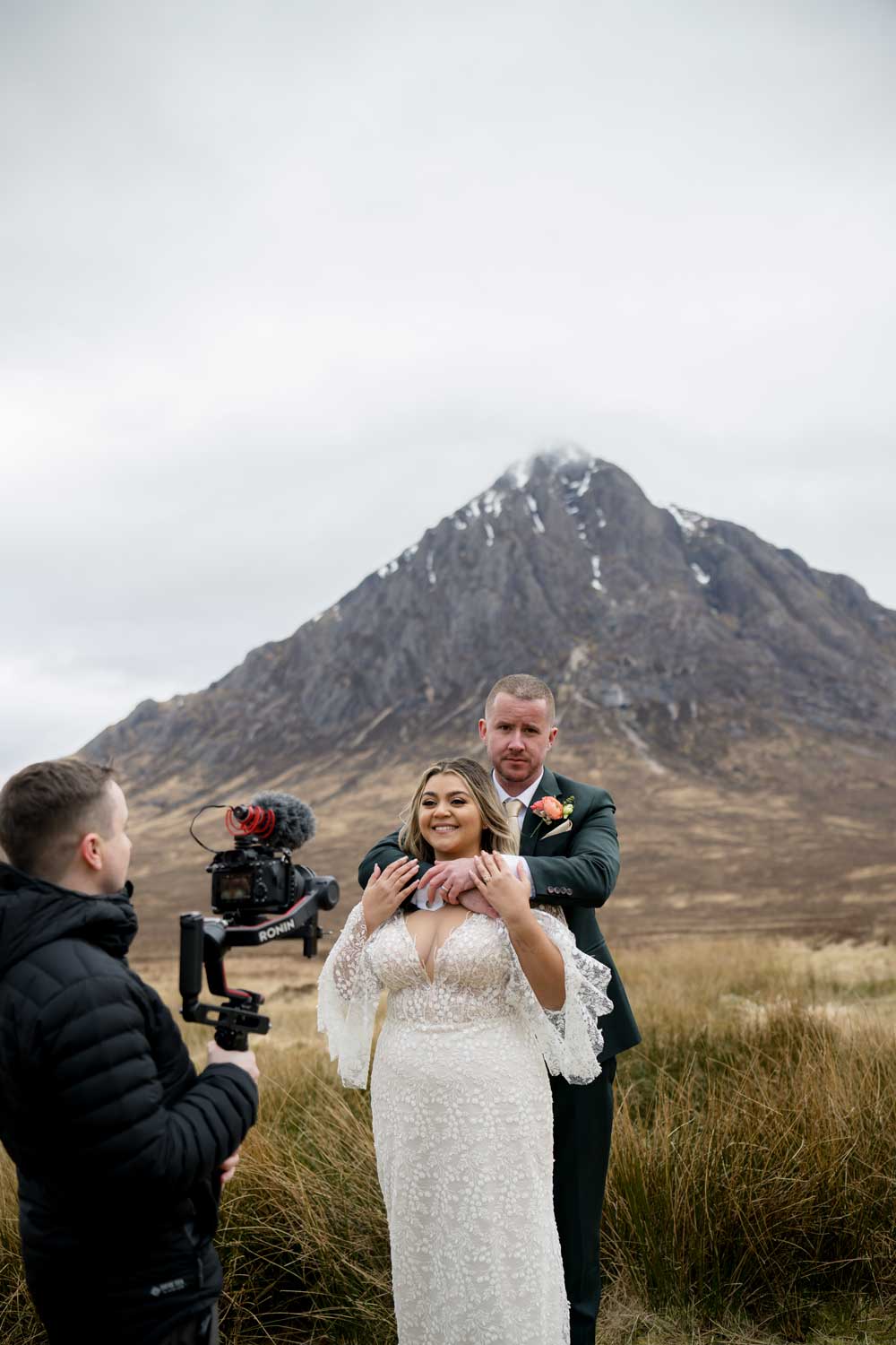 michael westcott filming an elopment couple with the buachaille etive mor in background