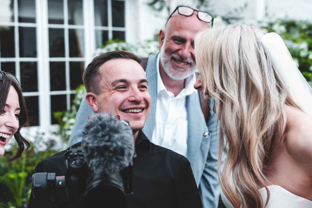 michael westcott films smiling at brdie after showing footage on camera